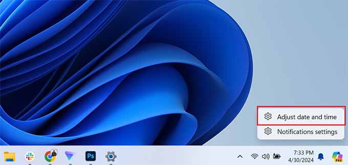 Windows 中选择调整日期和时间选项 Select the Adjust Date and Time option